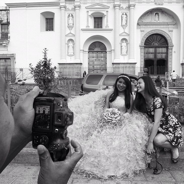 Portrait of a Quinceañera and an Asian girl at Parque Central of La Antigua Guatemala