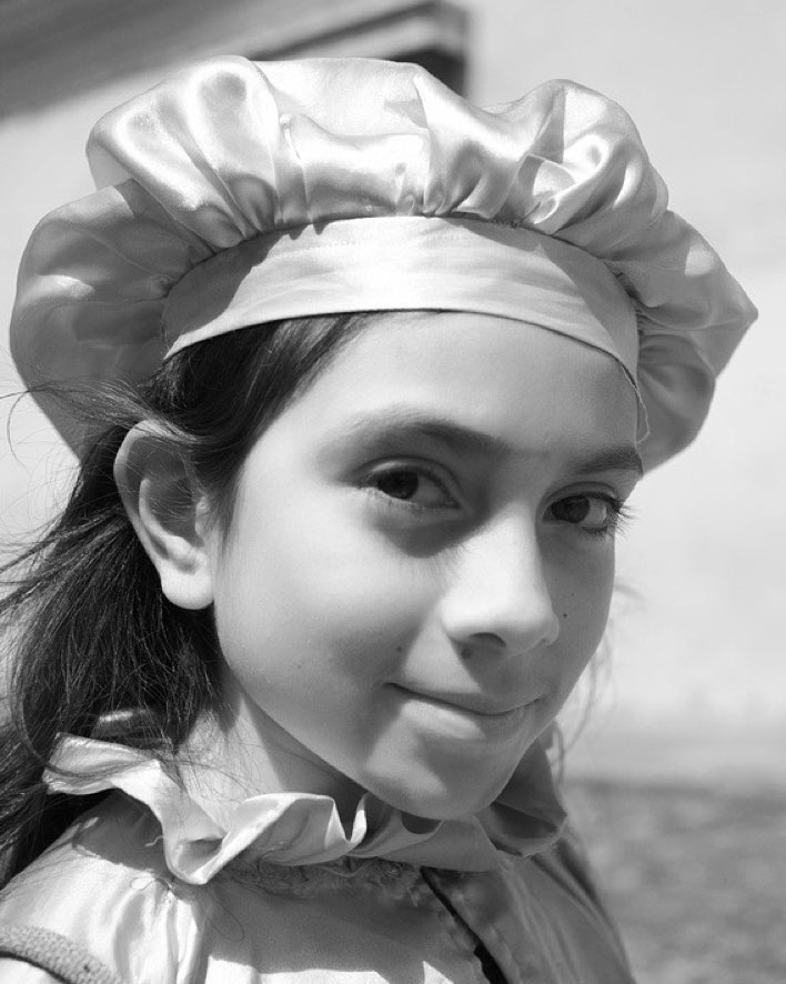 Street portrait of the youngest town crier of Antigua Guatemala