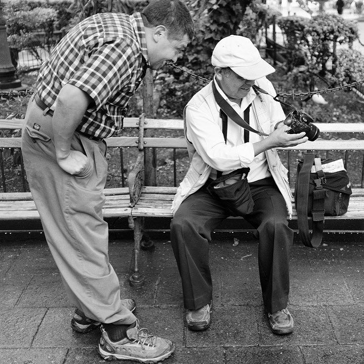 Photo sharing at Parque Central, Antigua Guatemala. No social media network required.