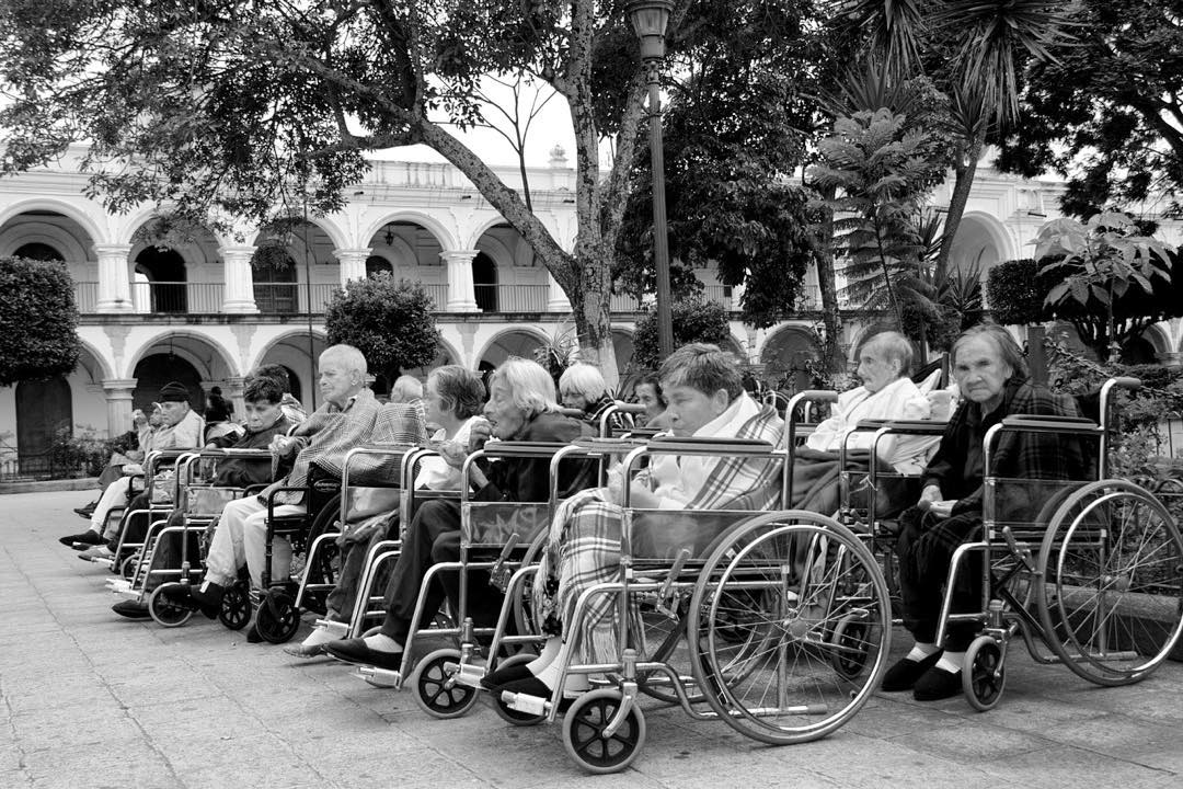 Mondays in the Sun (2015), a street photography stamp from Antigua Guatemala