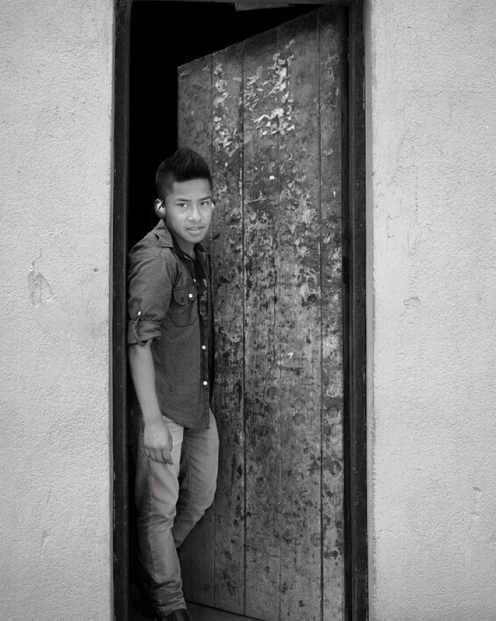 At the door, ready for what’s out there in San Juan del Obispo, La Antigua Guatemala