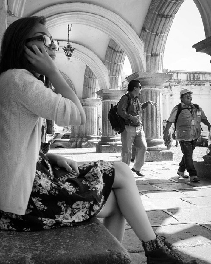 Watching people go by at Palacio del Ayuntamiento de La Antigua Guatemala, or Muni