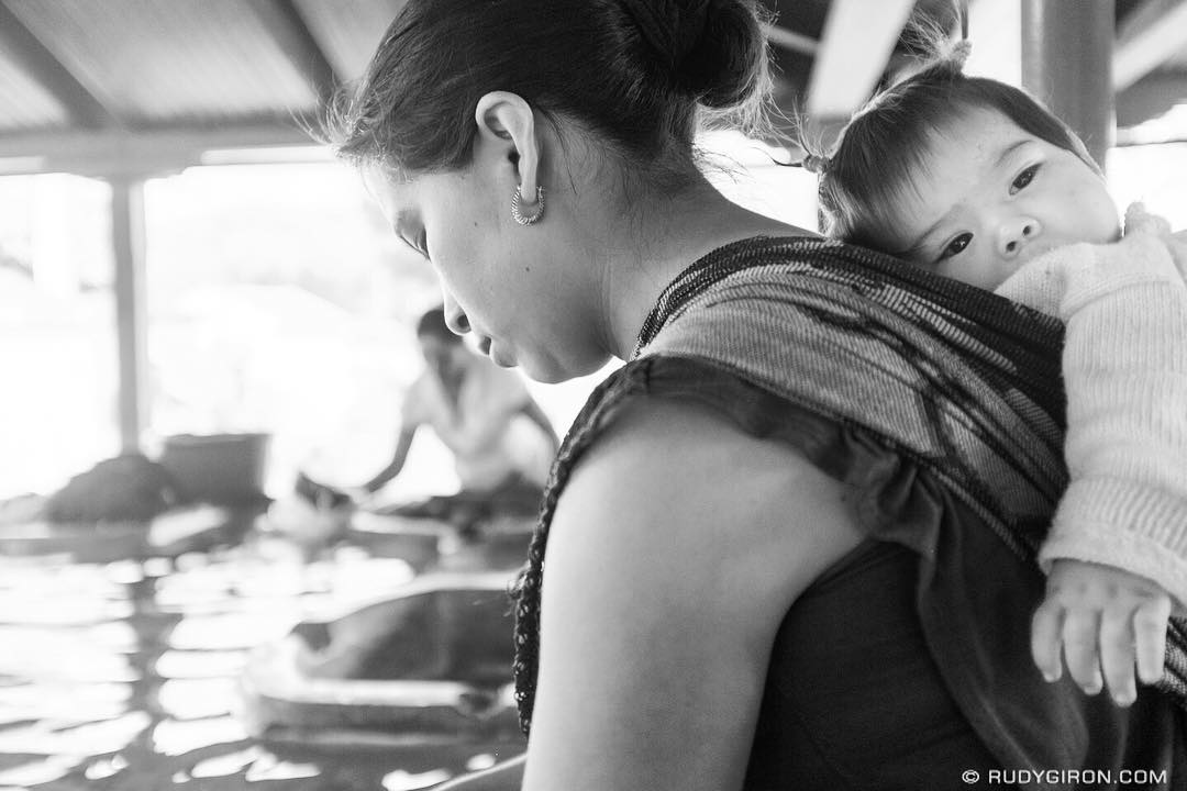 Street Photography — Mother and daughter at the public lavaderos doing some laundry.