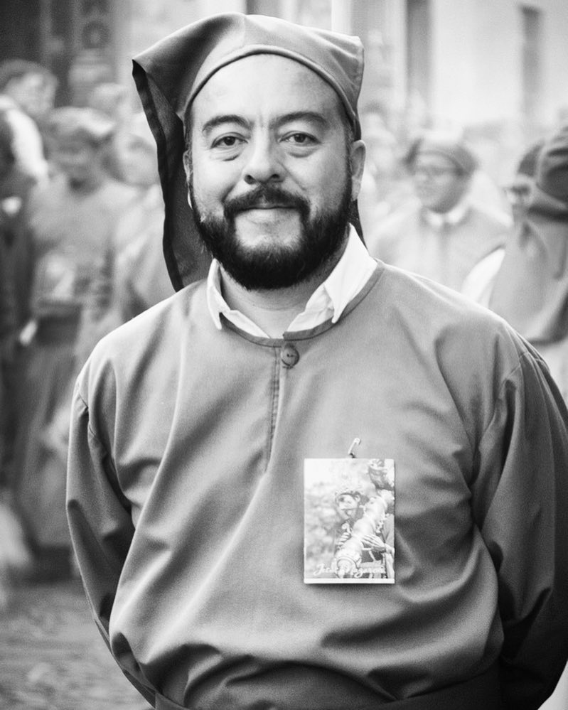 Street Portraits — Cucurucho Wicho Berdúo stops for one second for an impromptu portrait session during a procession.