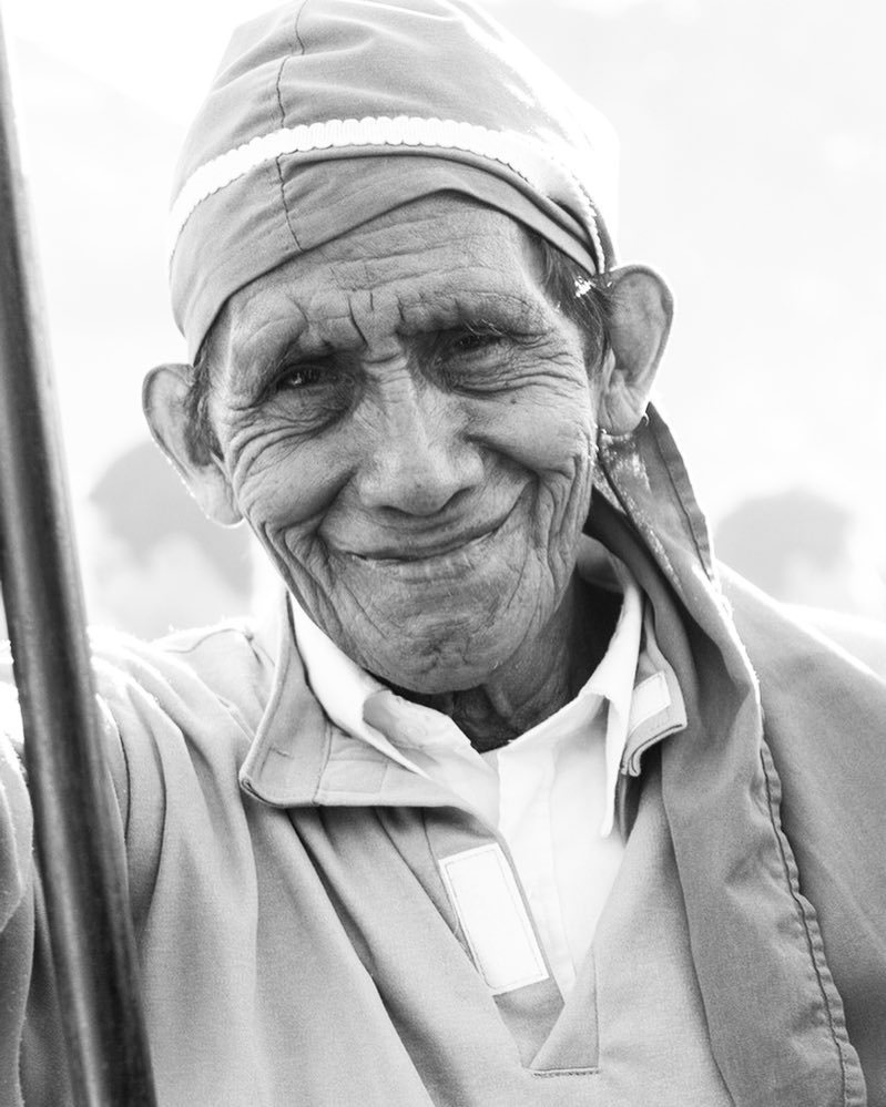 Sreet Portraits of Strangers — Weathered cucurucho face during a Lent procession.